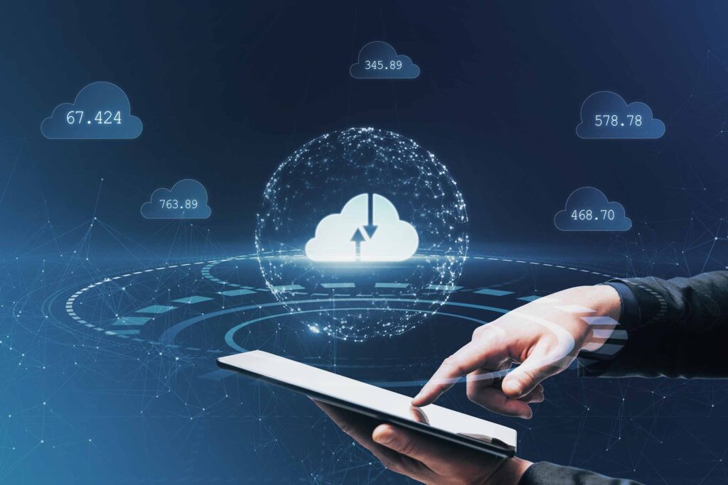 Man holding a Tablet in his hand and doing cloud Computing